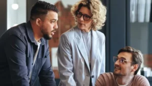 three people discussing marketing strategy