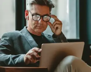 Global Headhunting 1 man working on laptop